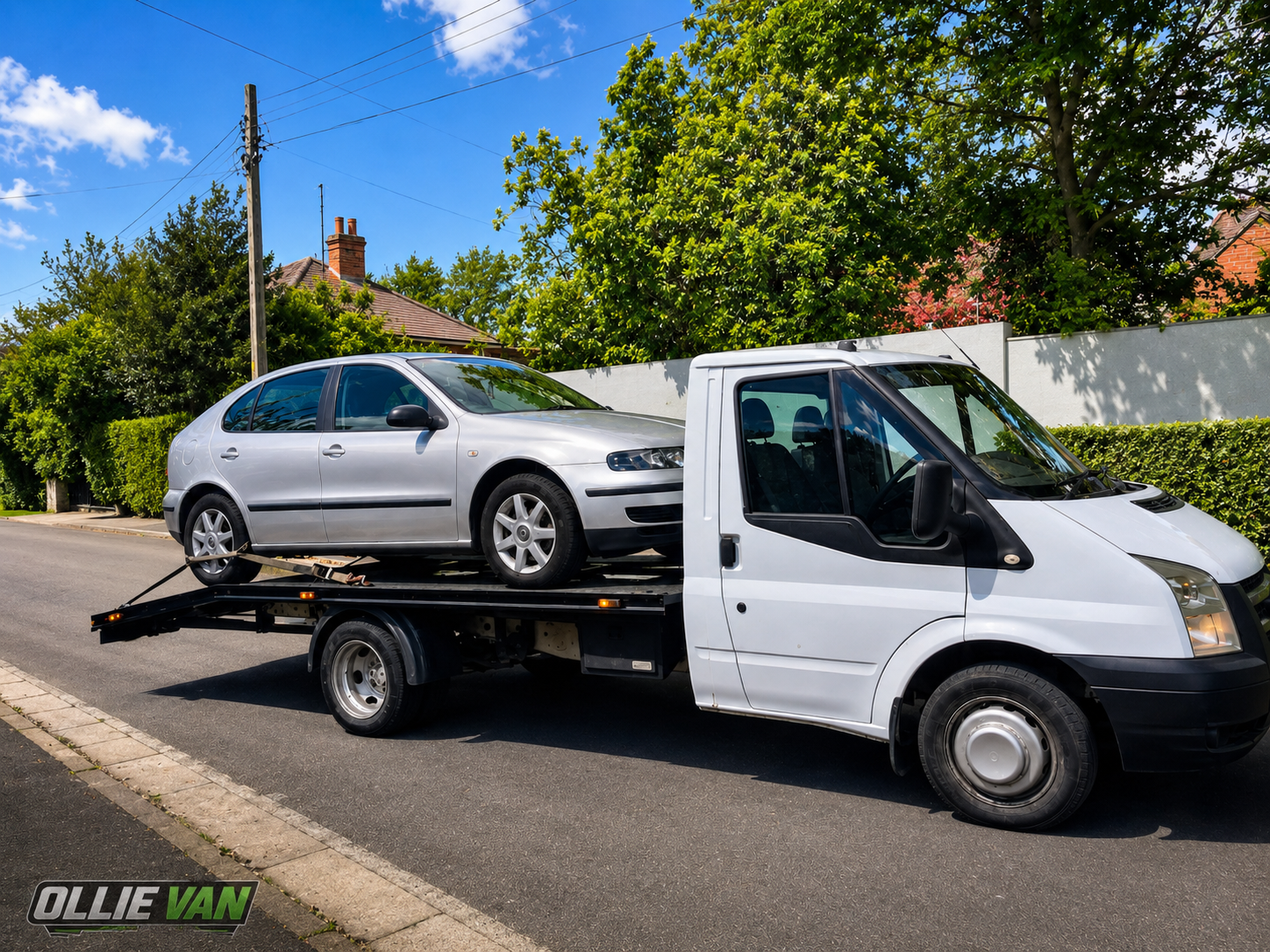 Ollie Van collecting a car on a recovery truck in Ireland